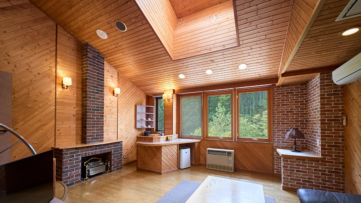 Wood-lined living room in the Kiraboshi suite at Minakami Sansou